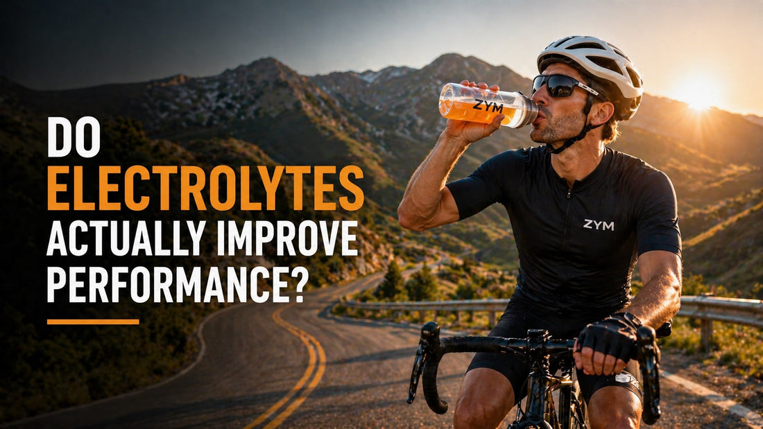 athlete drinking electrolyte drink during endurance training to improve performance in warm conditions